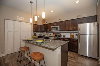 Kitchen lights and cabinet at Level 25 at Cactus by Picerne, Nevada